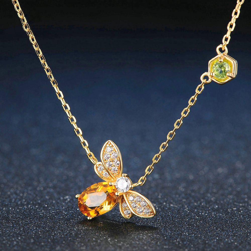 Pear-Shaped Peridot and White Lab-Created Sapphire Butterfly Outline  Silhouette Pendant in Sterling Silver | Peoples Jewellers